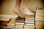 Feet walking on books