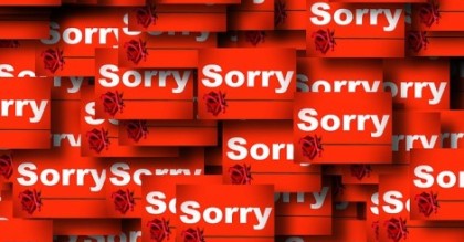 Collage of "Sorry" notes with a rose graphic.