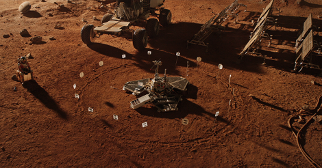 Screenshot from The Martian showing a circular array of numbers around a rotating camera that was used to communicate between Mars and Earth