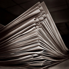 stack of papers in an office photo