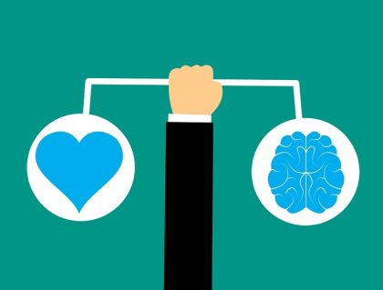 Graphic of a balance between a heart and a brain